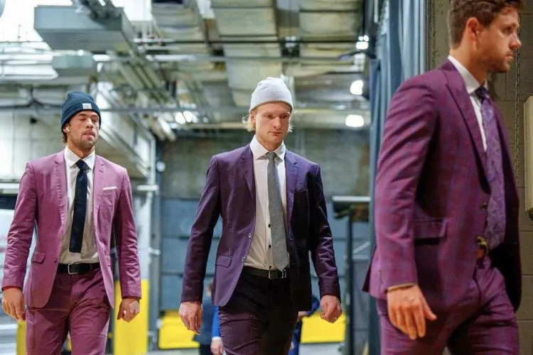 Why Do Hockey Players Wear Suits? All You Need To Know